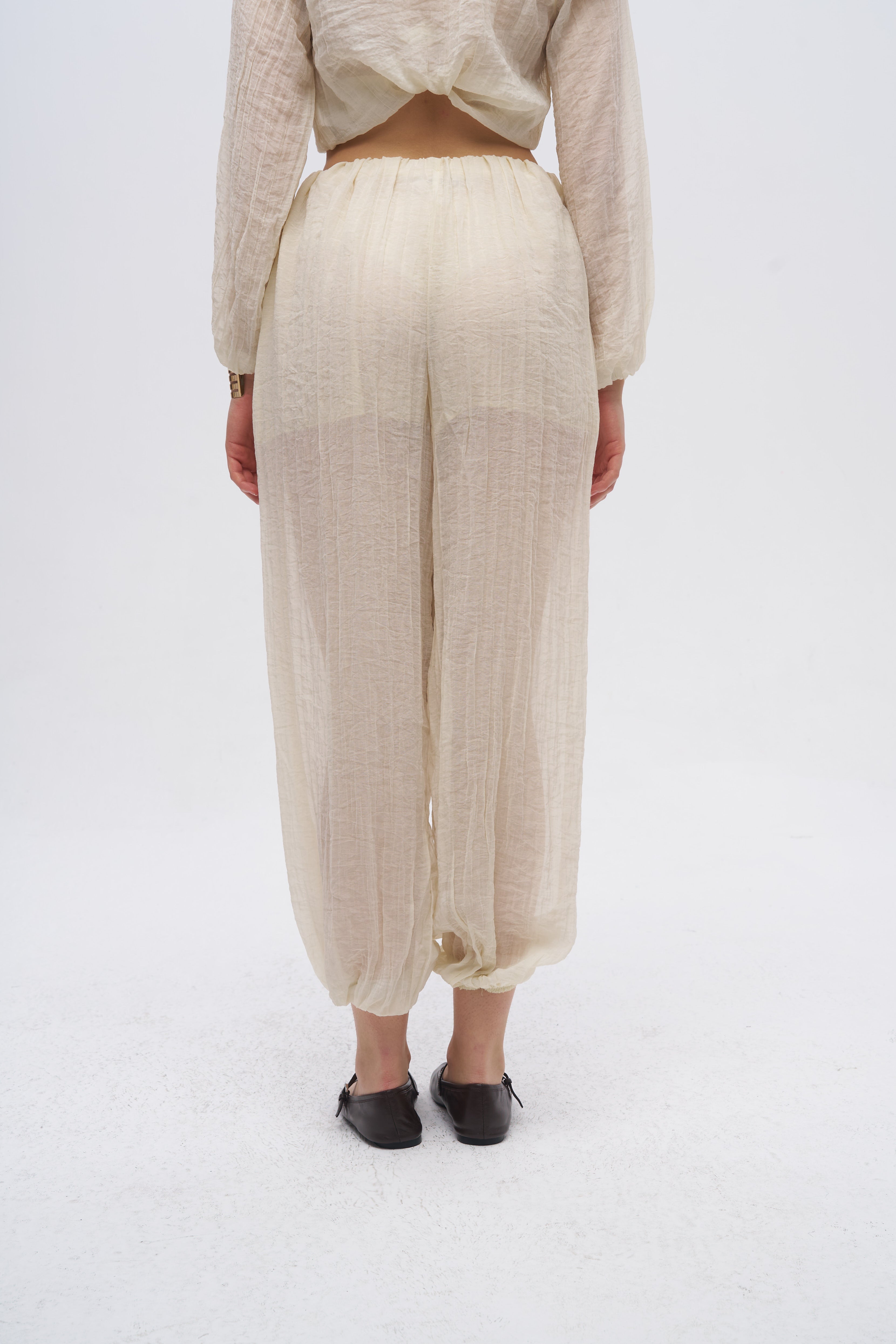 Beli ve Paçası Lastikli Dokulu Balon Pantolon Sarı