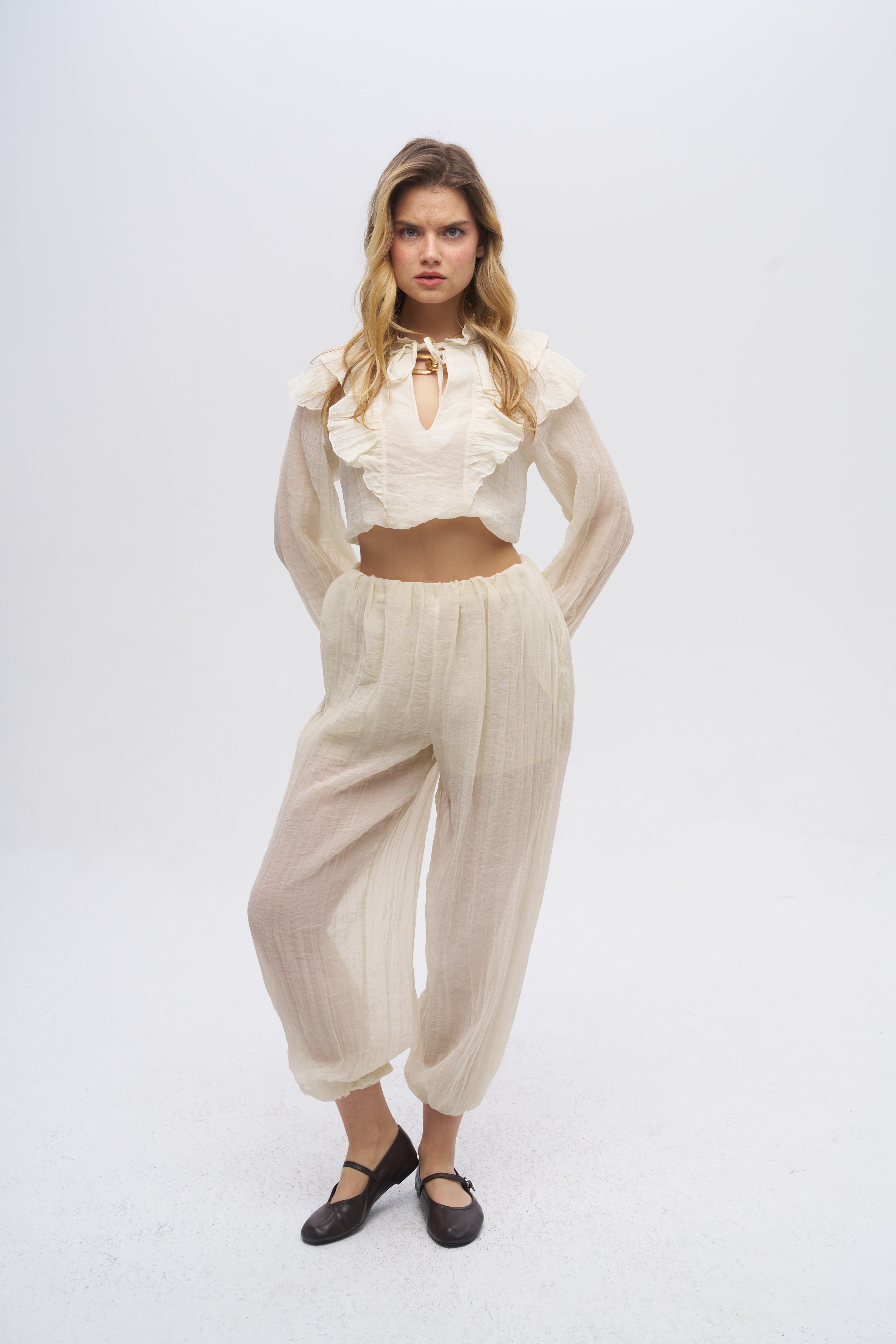 Beli ve Paçası Lastikli Dokulu Balon Pantolon Sarı