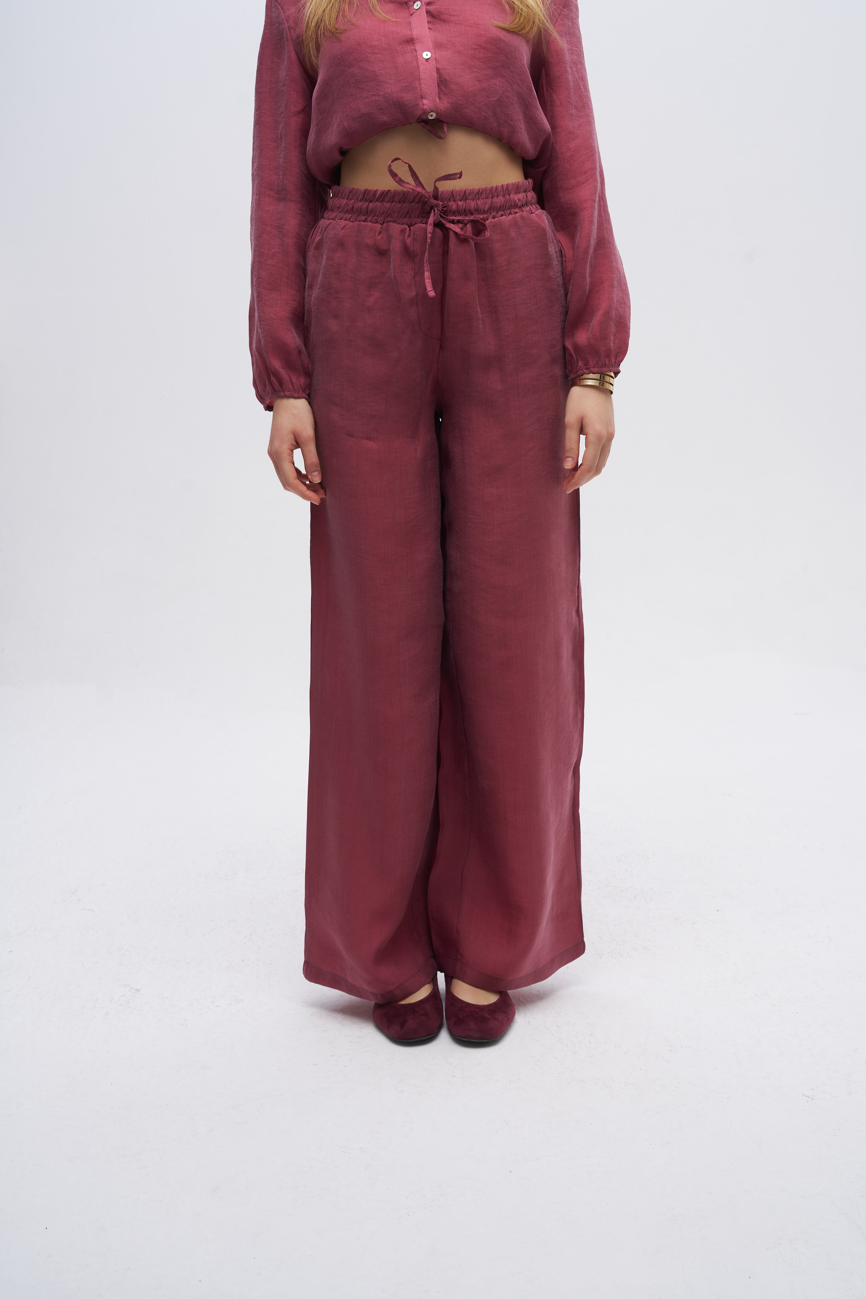 Beli Lastikli ve Bağcıklı Bol Paça Pantolon