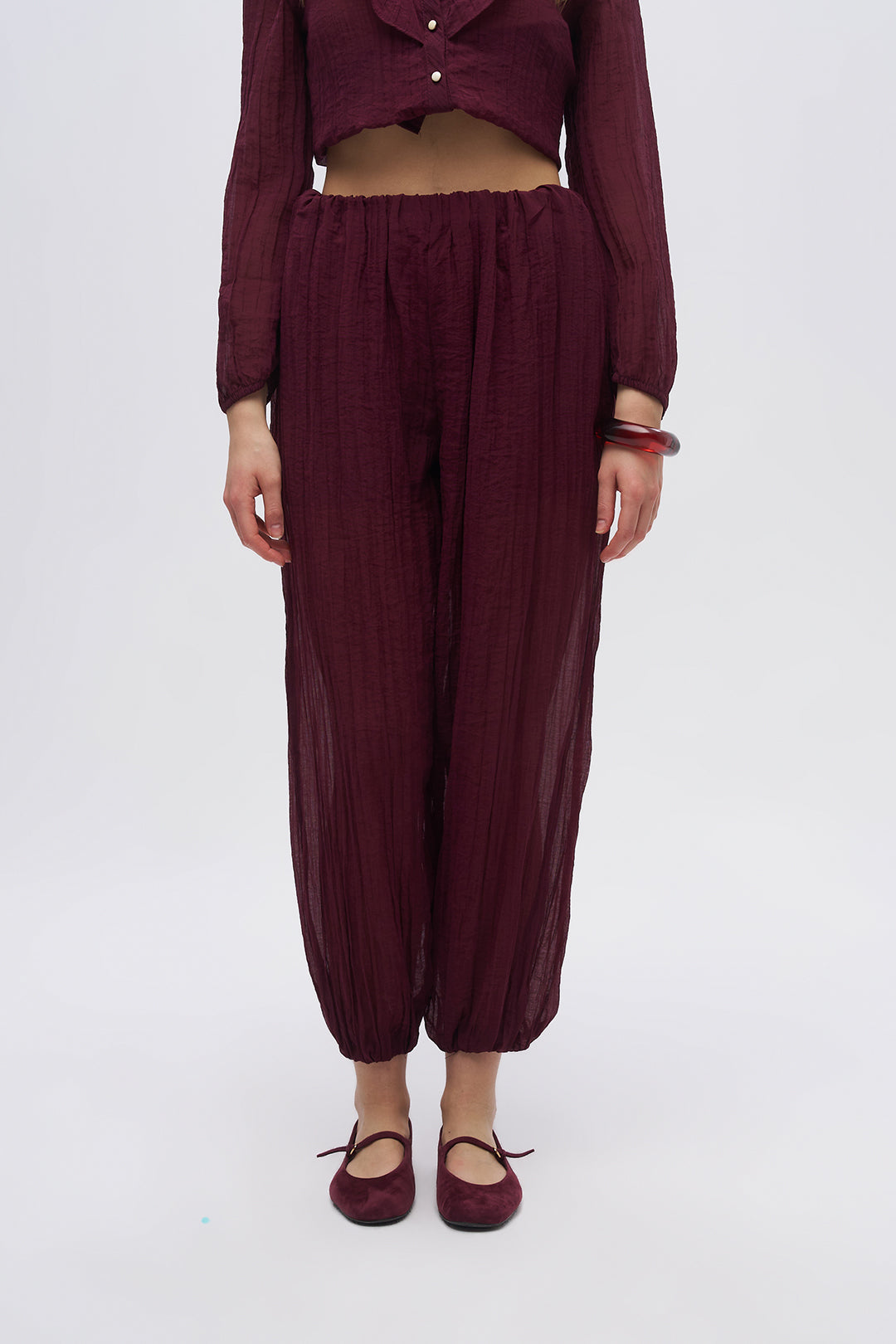 Beli ve Paçası Lastikli Dokulu Balon Pantolon Bordo
