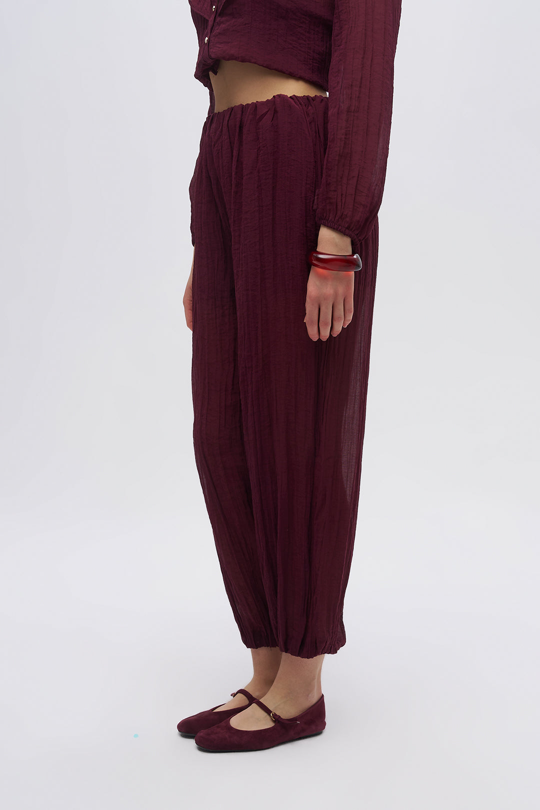 Beli ve Paçası Lastikli Dokulu Balon Pantolon Bordo