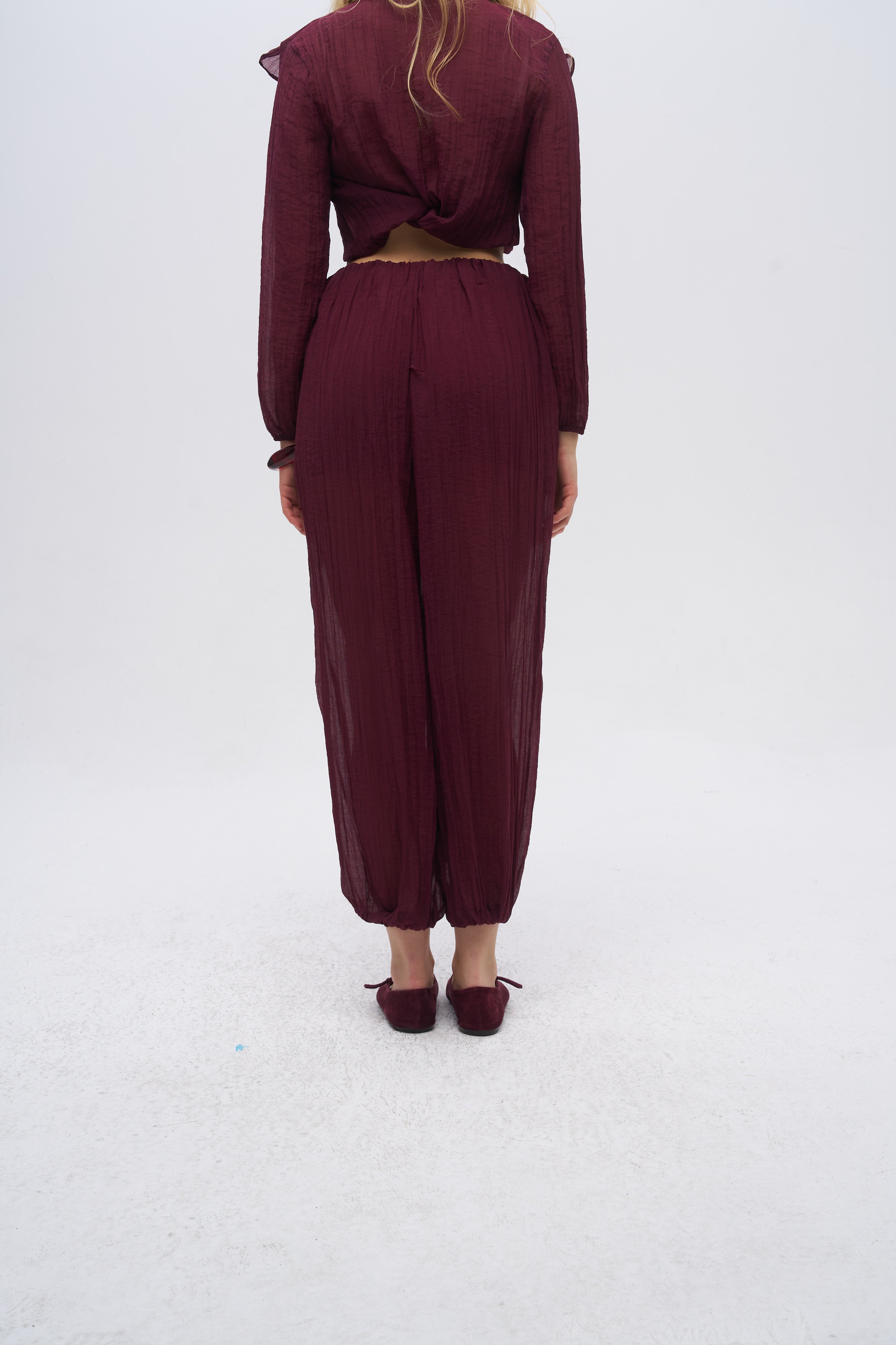 Beli ve Paçası Lastikli Dokulu Balon Pantolon Bordo