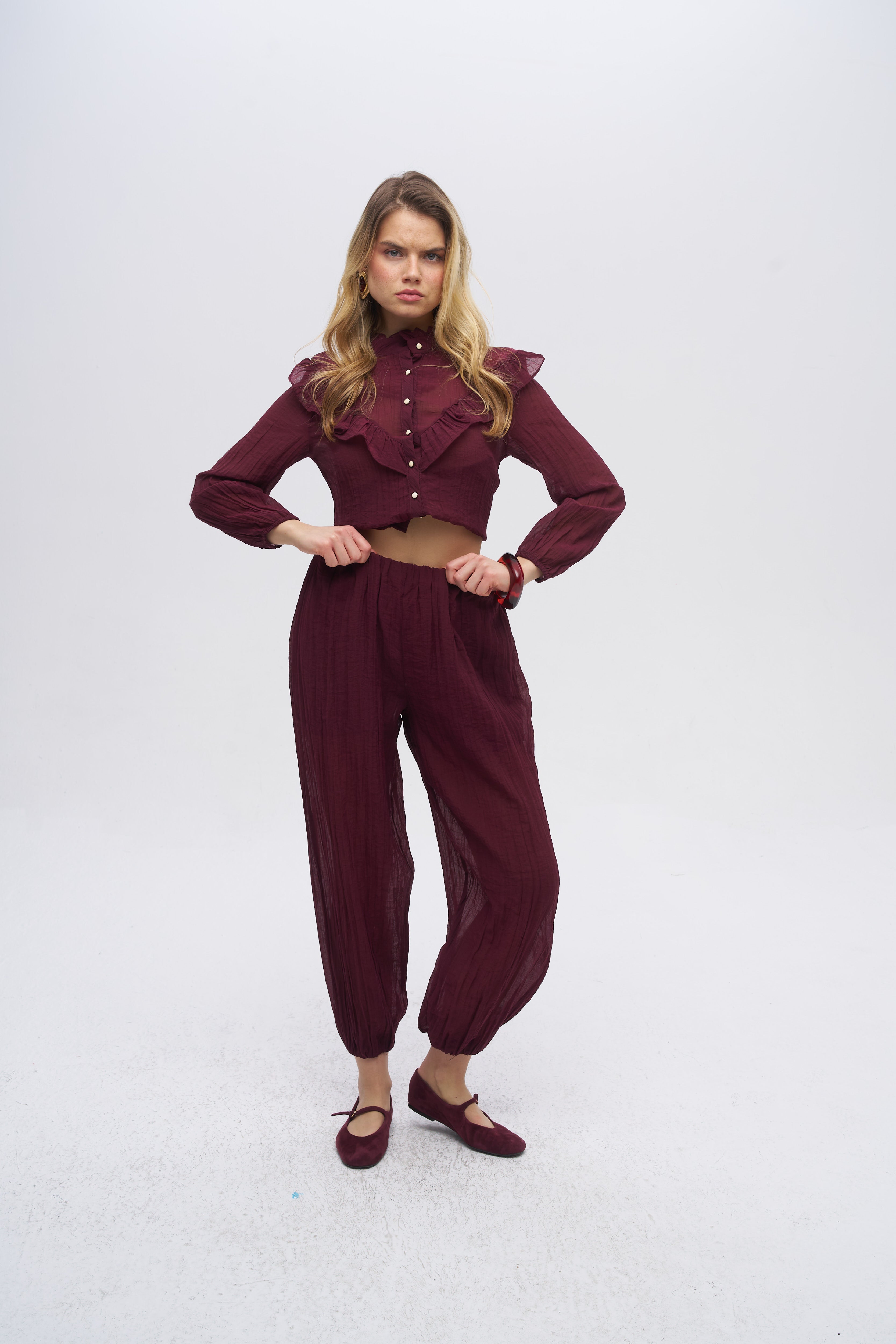 Beli ve Paçası Lastikli Dokulu Balon Pantolon Bordo