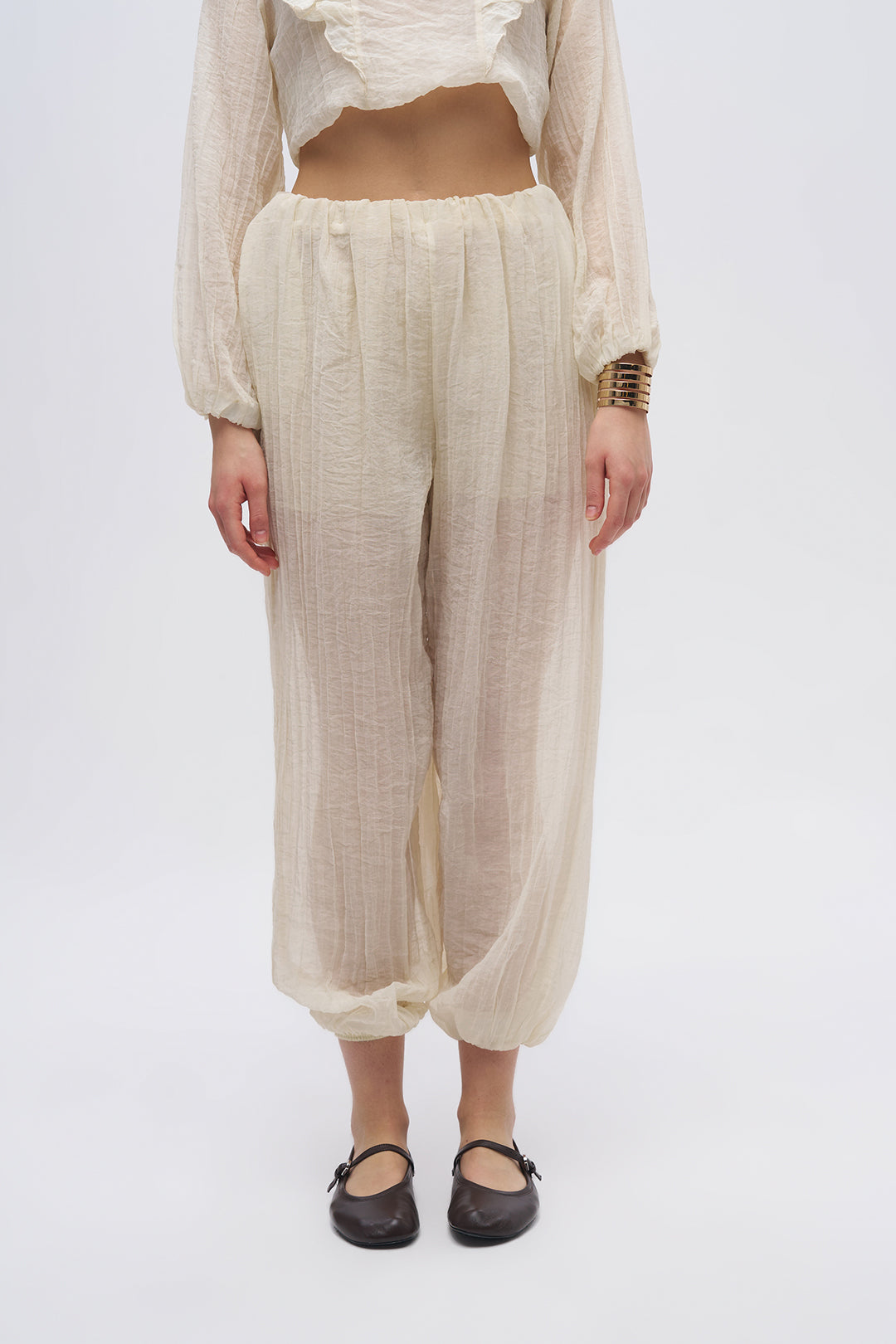 Beli ve Paçası Lastikli Dokulu Balon Pantolon Sarı