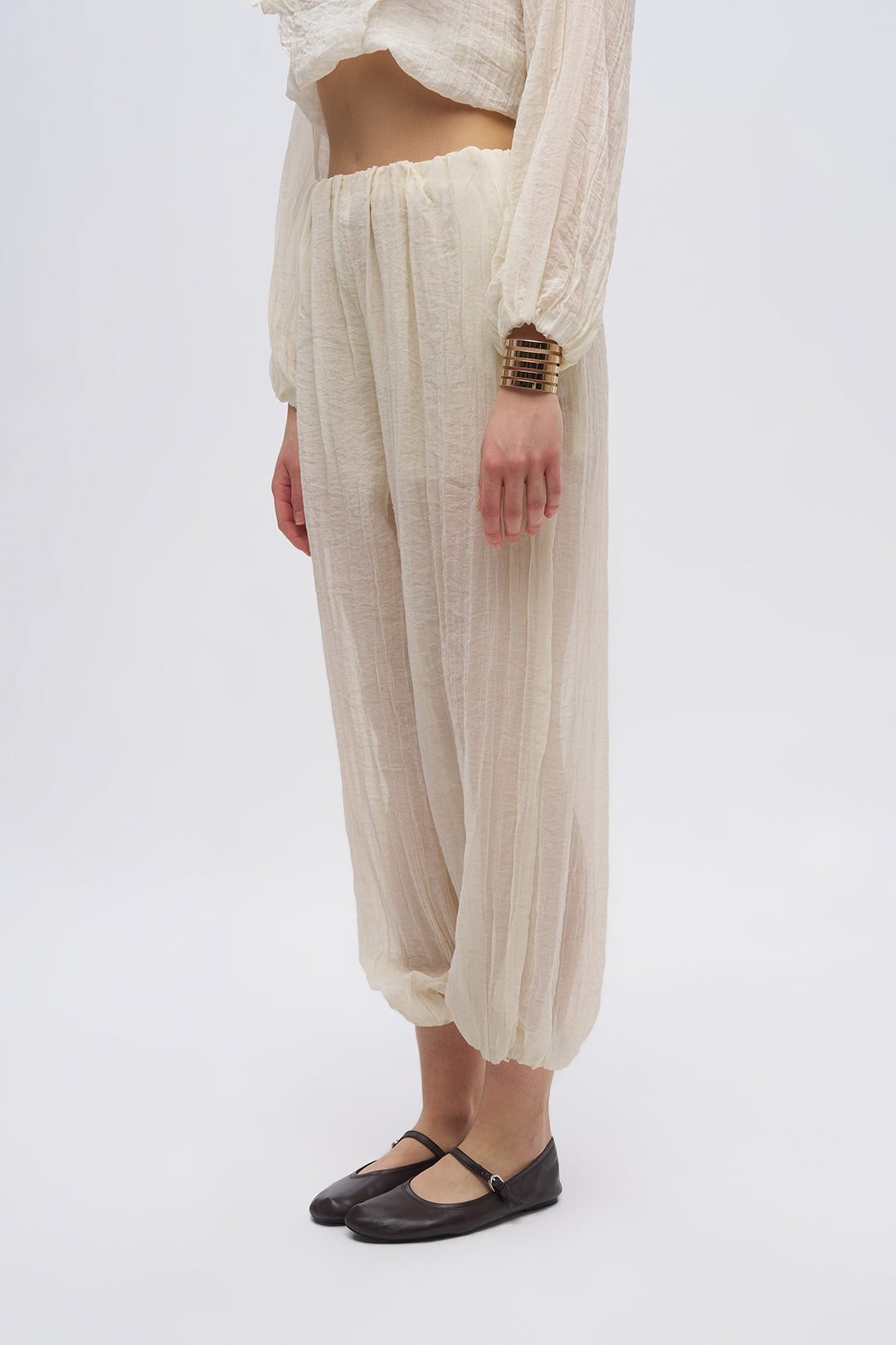 Beli ve Paçası Lastikli Dokulu Balon Pantolon Sarı