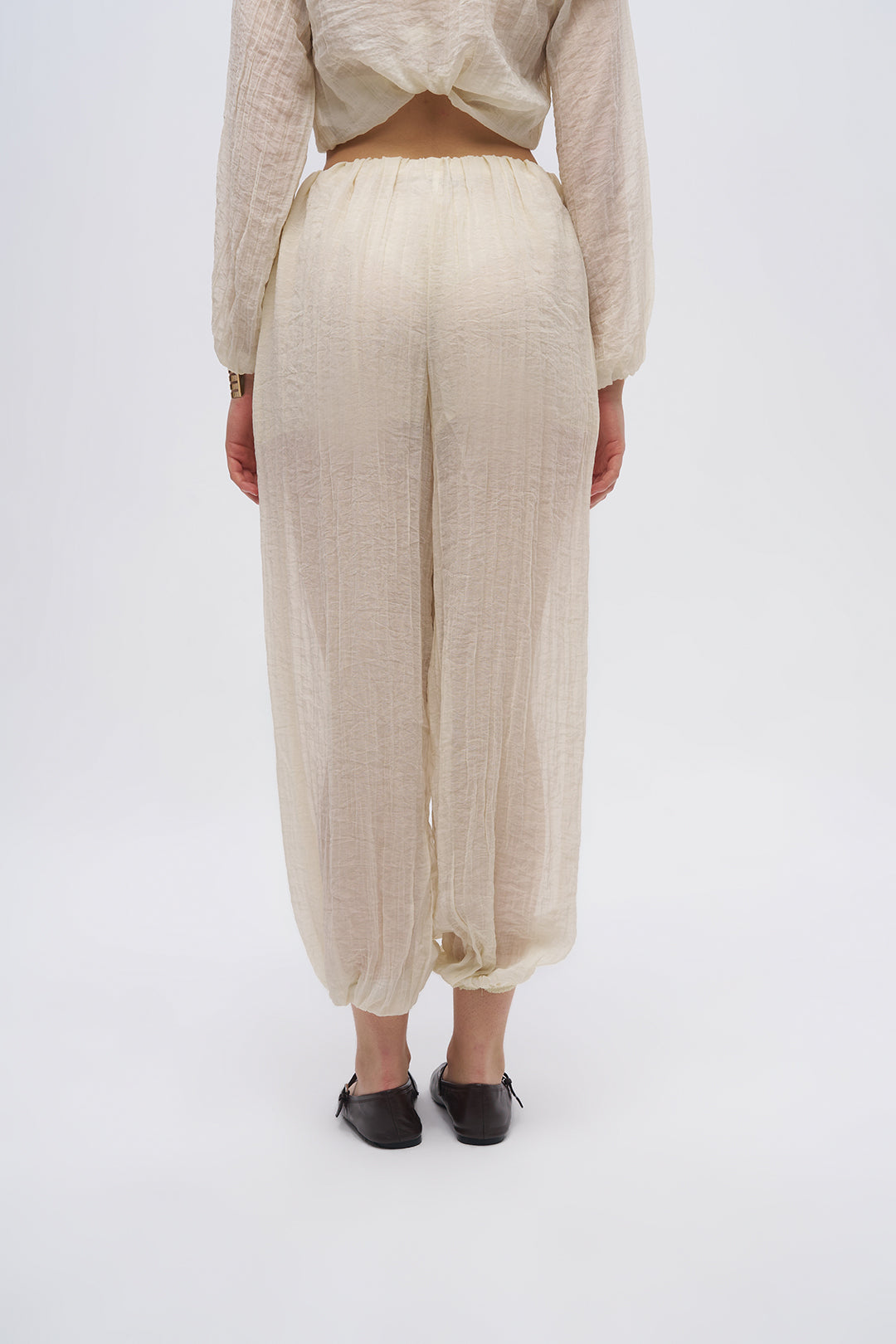 Beli ve Paçası Lastikli Dokulu Balon Pantolon Sarı