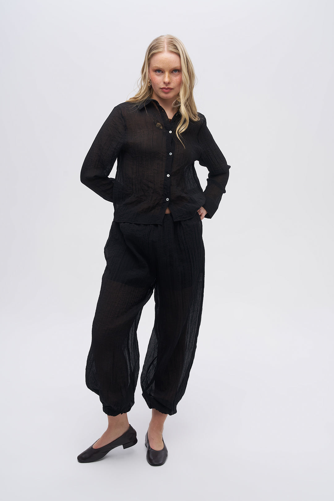 Beli ve Paçası Lastikli Dokulu Balon Pantolon Siyah